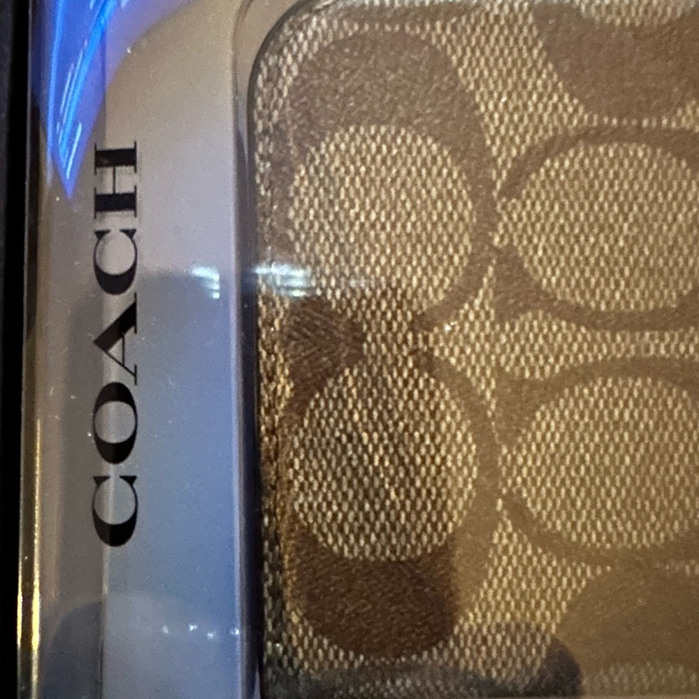 Authentic COACH phone wallet case new with tags has card slots